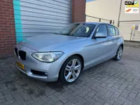 BMW 1-serie 118i Upgrade Edition automaat NAV.+ Airco Bj:2012 NAP!