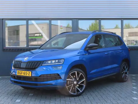 Škoda Karoq 1.5 TSI ACT Sportline Business | trekhaak wegklapbaar | camera | Elektrisch bedienbare a