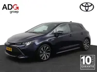 Toyota Corolla 1.8 Hybrid Dynamic | Stoelverwarming | Leder-Stof bekleding | Trekhaak |