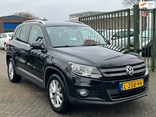 Volkswagen Tiguan 1.4 TSI Sport&Style Airco cruis control parkeer sensor.