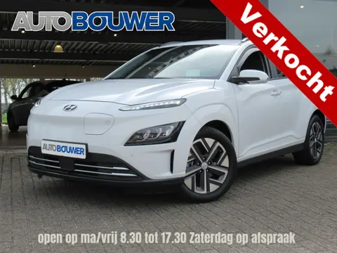 Hyundai KONA EV Premium 64 kWh | 3 fase | Warmtepomp 2e eigen | dealer onderh | tr.haak |  full opti