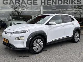 Hyundai Kona EV Fashion Sky 64 kWh | SOH: 96,8% | Sky PANO Dak | HUD | Dodehoek Detectie | LED