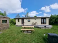 Rustig gelegen chalet met ruime tuin op het westen