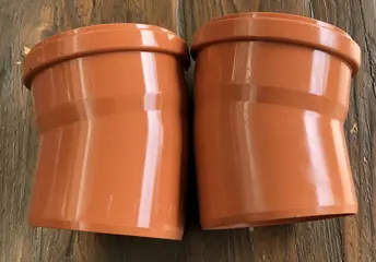 PVC bocht, 125 mm 15 graden Binnen-buiten glijmof, SN 4. Nieuw.