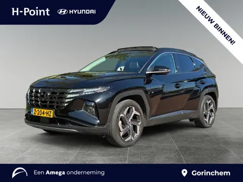 Hyundai Tucson 1.6 T-GDI 265pk PHEV Premium Sky 4WD | SCHUIF/KANTELDAK | 19'' LM-VELGEN | NAVI | CRU