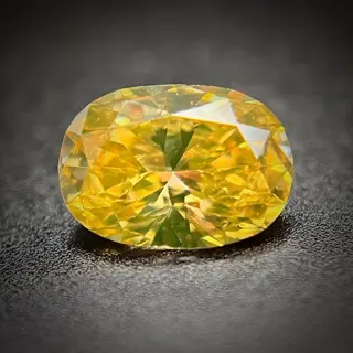 1 pcs Diamant - 0.52 ct - Ovaal - fancy intens bruinachtig