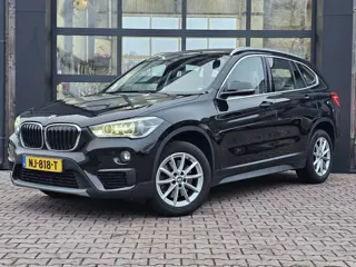 BMW X1 sDrive20i Centennial High Executive | Automaat | Navi | Stoelverwarming | HUD | Parkeersensor