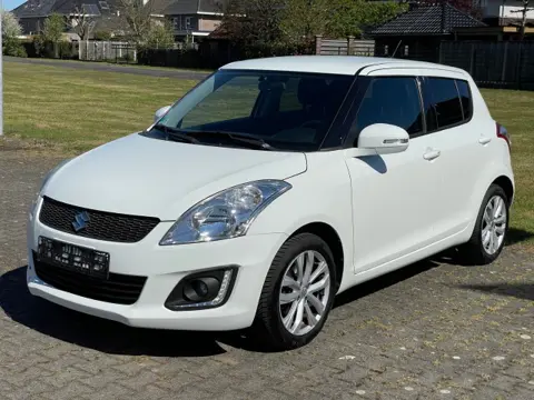 SUZUKI SWIFT 1.2 Exclusive EASSS/ ECC/ Cruise/ Keyless/ LM/ LED/ Stoelverwarming/ Privacy