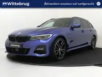 BMW 3 Serie Touring 330e High Executive (bj 2021)