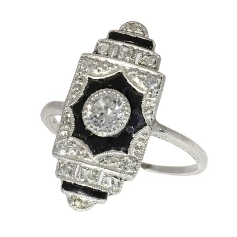 A 1920s Art Deco Diamond and Onyx Ring with Crisp Geometric Design
