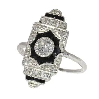 A 1920s Art Deco Diamond and Onyx Ring with Crisp Geometric Design
