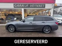 BMW 3 Serie Touring 330e High Executive (bj 2020)