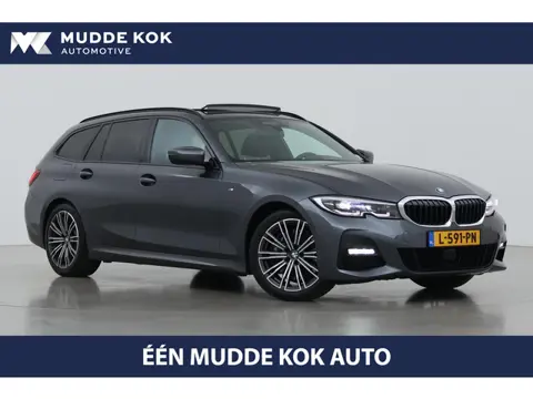 BMW 3-serie Touring 330i High Executive | M-Sport | Panoramadak | Stoelverwarming | PDC V+A | 18 Inc