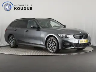 BMW 3 Serie Touring 330e Business Edition + M Sport (Pano / Navi / Cruise / Camera / Carplay)