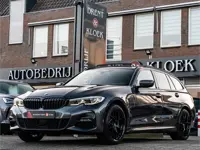 BMW 3 Serie Touring 330e xDrive High Exe M-Sport PANO LASER HARMAN KARDON HUD TREKHAAK CAMERA 19 INC