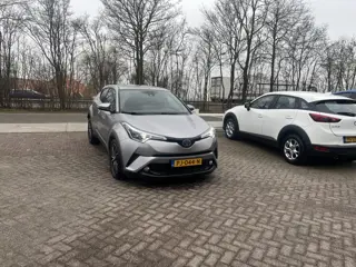 Toyota C-HR 1.8 Hybrid Executive TREKHAAK STOELVERWARMING CAMERA ZWARTE HEMEL