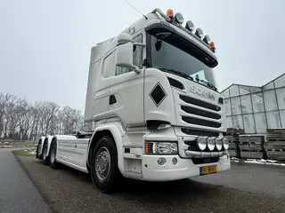 Scania R580 Haak arm container auto