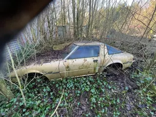 Mazda RX-7 RX-7 UNIEKE SCHUUR VONST MET ORIGINELE WANKELMOTOR € 999 IDEALE DONOR AUTO  GEVONDEN ACHT