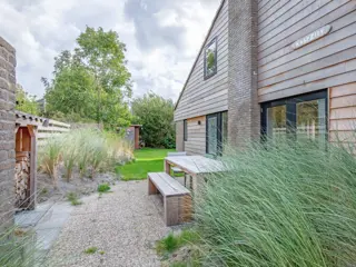 Vrijstaand, warm ingericht vakantiehuis aan de rand van Villapark Residentie Texel