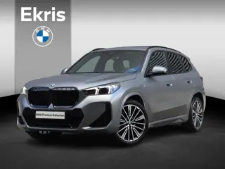 BMW X1 sDrive18i | M Sportpakket | Panodak | Trekhaak | Getint Glas | Comfort Access | Camera | Appl