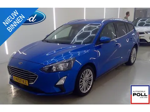 Ford Focus 125pk Titanium X Navi Camera Winter Parking Dodehoek pack Adap Cruise El. Klep Wagon Deal