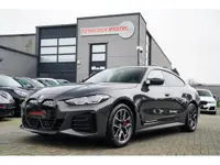 BMW I4 M50 High Executive 84 kWh | BTW | 360 Camera | LASER | Dravitgrau metallic | Adaptieve Cruise