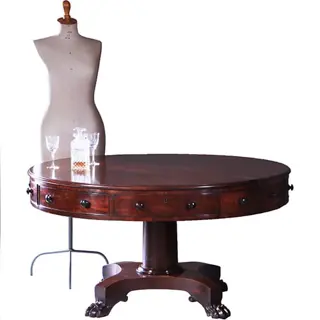 Drumtabel met massief mahonie blad 4 laden en 4 schijnladen ca 1815