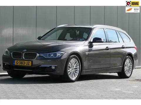 BMW 3-serie Touring 320i Executive Luxury Pano Navi Leder Camera