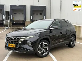 Hyundai Tucson 1.6 T-GDI PHEV Premium Sky 4WD, panoramadak, alle opties, zwart metallic, 1 e eigenaa