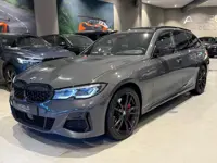BMW 3 Serie Touring M340i xDrive Edition Plus Panodak Laser Trekhaak H/K Sound Carbon HUD 360Cam