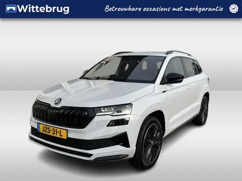 Škoda Karoq 1.5 TSI ACT Sportline Business / TREKHAAK/ STUUR+STOELVERWARM.V+A/ PARK.SENSOR.V+A/ CAME