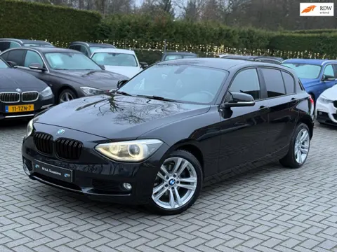 BMW 1-serie 118i Business+|Nieuwe Ketting + Klepseals|Leder|Navigatie|Cruise control|Xenon|Climate c
