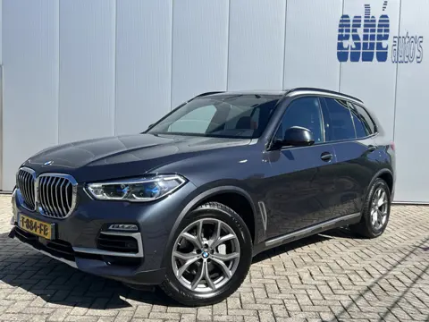 BMW X5 xDrive30d High Executive X-Line Luchtvering Individual Tartufo leder Trekhaak 3500 kg Panoram