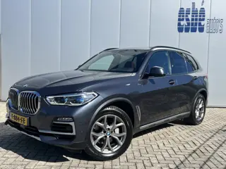 BMW X5 xDrive30d High Executive X-Line Luchtvering Individual Tartufo leder Trekhaak 3500 kg Panoram