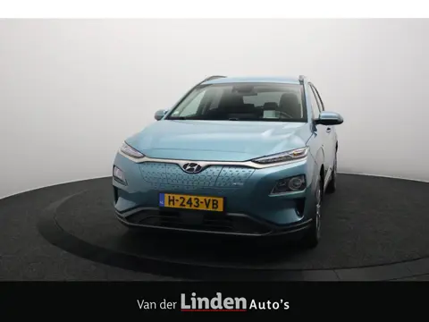Hyundai KONA EV Premium 64 kWh 3- Fase SOH 96,1% | Warmtepomp | Trekhaak | Leer | Camera | Head-Up D