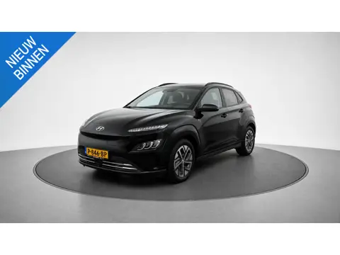 HYUNDAI KONA EV PREMIUM 64 KWH (100% SOH) I P-CAMERA I STOELVERWARMING I WARMTEPOMP I APPLE CARPLAY