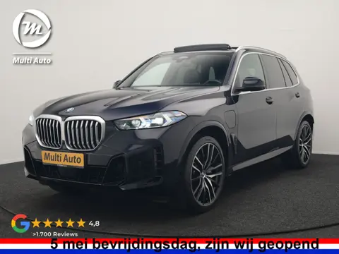BMW X5 xDrive50e M Sport PHEV 490pk Dealer O.H. | Panodak Sky Lounge | Luchtvering | Head Up | 360 C