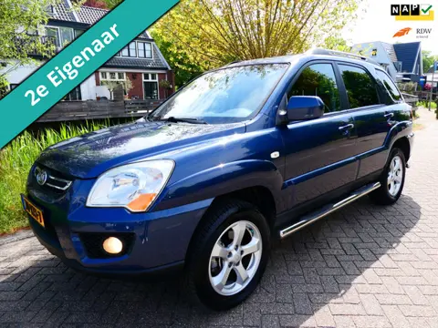 Kia Sportage 2.0 CVVT Fifteen 2e eig. Clima Cruise Kanteldak Trekhaak 1400kg.