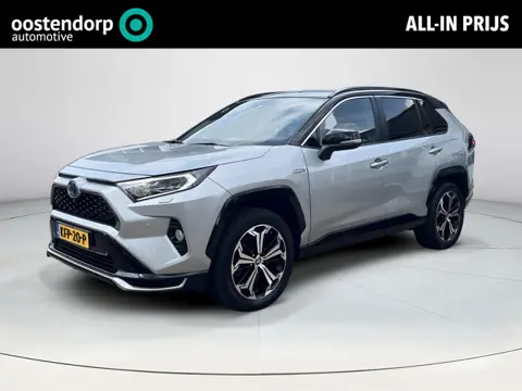 Toyota RAV4 2.5 Plug-in Hybrid AWD Bi-Tone Plus | Trekhaak | Geventileerd leer | Carplay | Stoel- + 