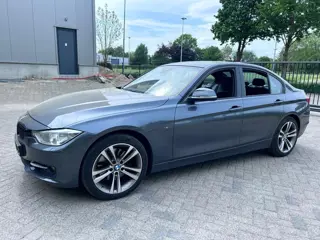 BMW 3-serie 328i High Executive haedUp Leer navi