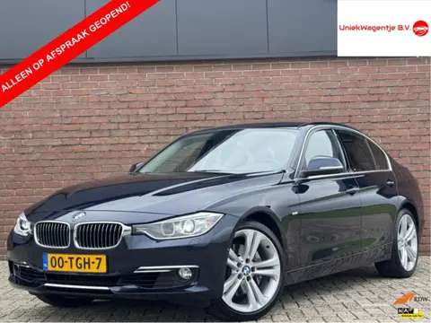 BMW 3-serie 335i HIGH EXECUTIVE | NL-AUTO! | LEDER!