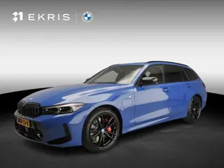 BMW 3 Serie Touring 330e | Individual Lak | M-Sportpakket | LED | HUD | Trekhaak | Elektr. zetels | 