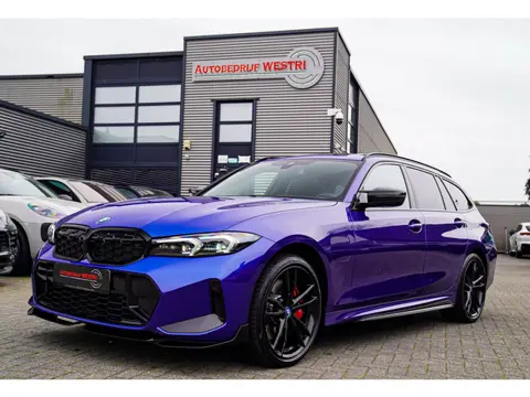 BMW 3-serie Touring 330e xDrive M-pakket | Panorama | HuD | Sfeerverlichting | BMW LED | Camera | Po
