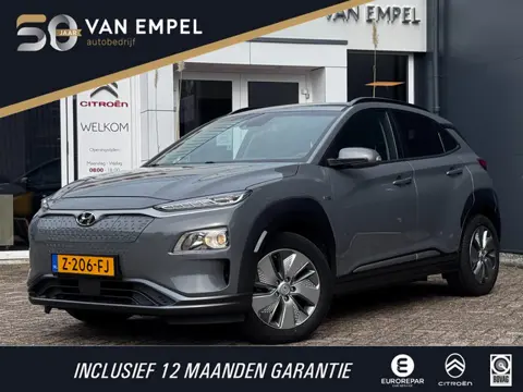Hyundai Kona EV Comfort Smart 39 kWh | 100% SOH | Trekhaak | Camera | Stoel + Stuurverwarming | Navi