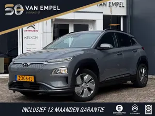 Hyundai Kona EV Comfort Smart 39 kWh | 100% SOH | Trekhaak | Camera | Stoel + Stuurverwarming | Navi