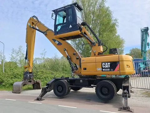 Cat M 322 D overslagkraag waste handler umslag bagger