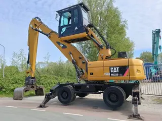 Cat M 322 D overslagkraag waste handler umslag bagger
