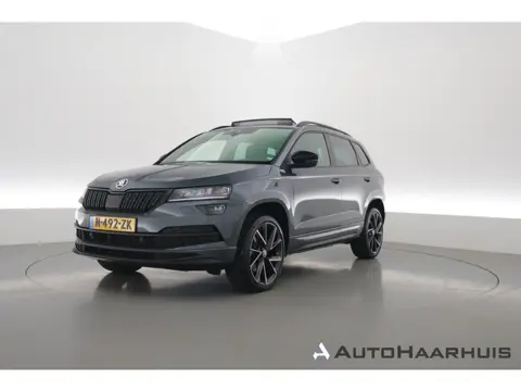 Škoda Karoq 1.5 TSI ACT Sportline Business | Dig. Cockpit | Pano | Elek. Trekhaak | Canton Audio | A