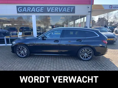 BMW 3 Serie Touring 330e High Executive (bj 2022)
