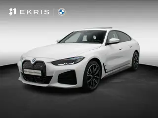 BMW i4 eDrive40 M Sportpakket Pro | Stuurwielrand Verwarmd | Achteruitrijcamera | Schuifdak | DAB | 